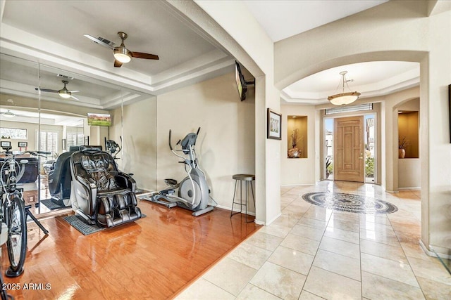 34014 N 43rd St, Cave Creek, AZ 85331 - workout room with a tray ceiling, arched walkways, and ceiling fan