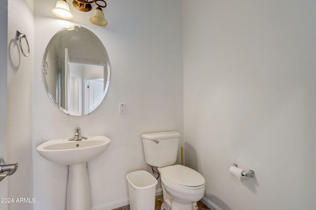 bathroom featuring toilet