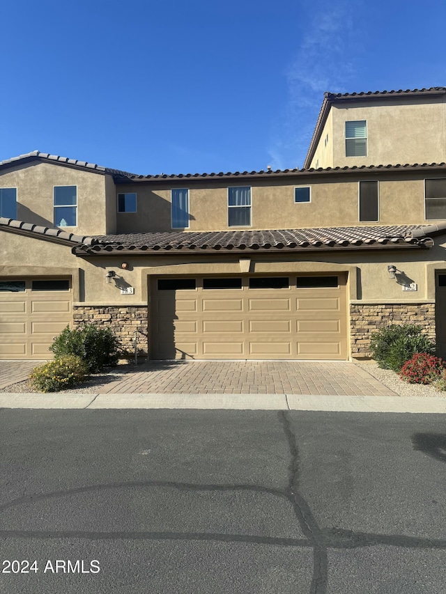 view of front of home with a garage