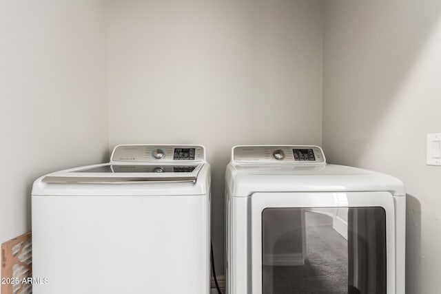 laundry area featuring separate washer and dryer