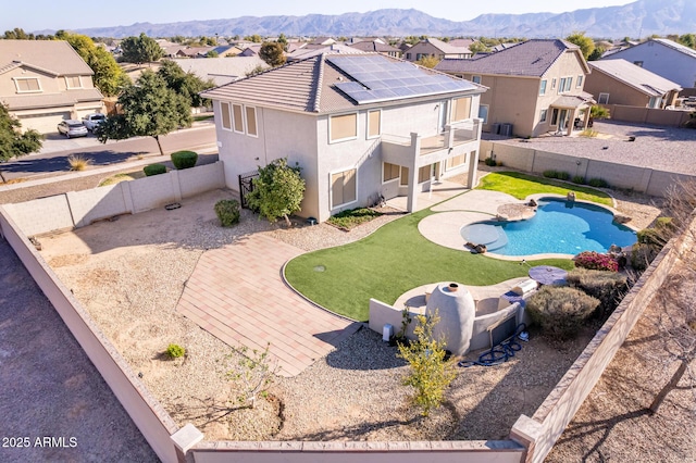 view of swimming pool featuring a mountain view