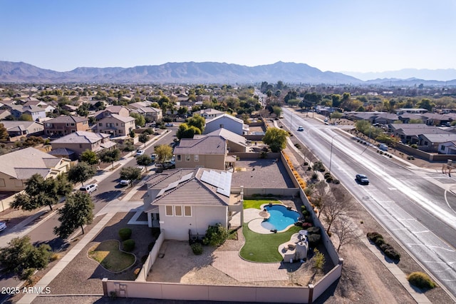 birds eye view of property featuring a mountain view