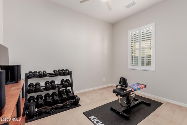 workout area featuring a ceiling fan, baseboards, visible vents, and carpet flooring