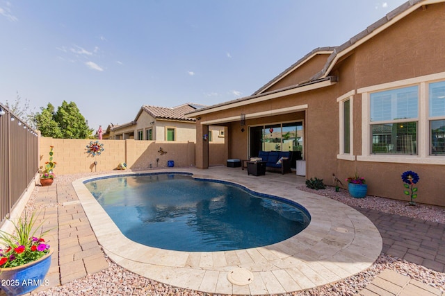 view of pool featuring a patio area, a fenced backyard, outdoor lounge area, and a fenced in pool