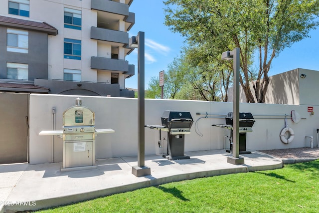 view of patio featuring a grill