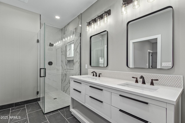 full bath featuring a marble finish shower, backsplash, and a sink