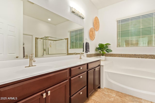 15862 W Fillmore St, Goodyear, AZ 85338 - bathroom with a shower stall, a garden tub, and double vanity