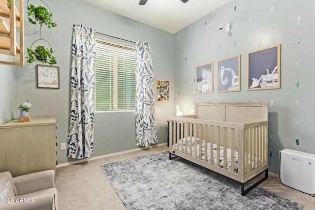 15862 W Fillmore St, Goodyear, AZ 85338 - carpeted bedroom with a nursery area, baseboards, and a ceiling fan