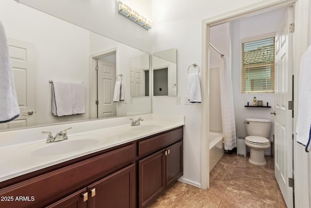 15862 W Fillmore St, Goodyear, AZ 85338 - full bath featuring toilet, double vanity, shower / tub combo with curtain, and baseboards