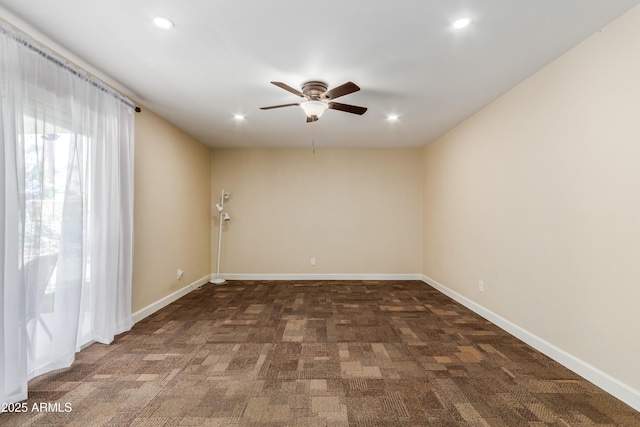 6009 W Medlock Dr, Glendale, AZ 85301 - unfurnished room with a ceiling fan, dark carpet, and recessed lighting