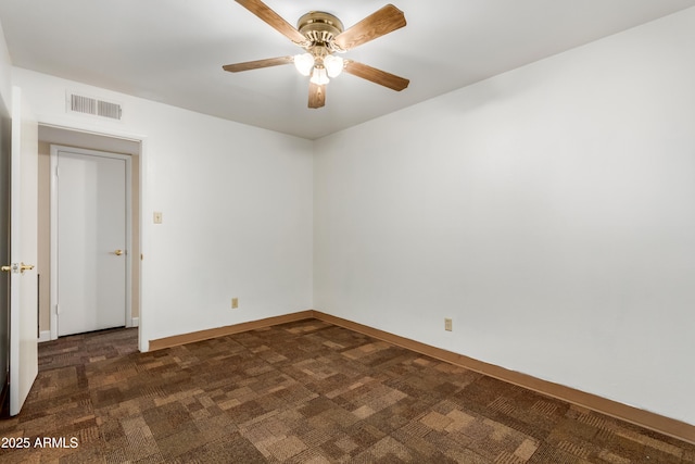 6009 W Medlock Dr, Glendale, AZ 85301 - spare room with dark carpet and ceiling fan