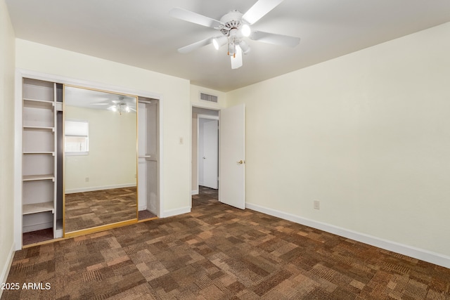6009 W Medlock Dr, Glendale, AZ 85301 - unfurnished bedroom with carpet, a closet, and a ceiling fan