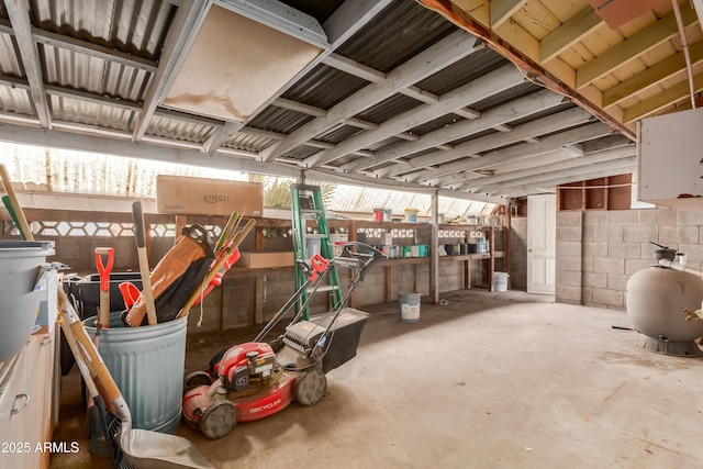 6009 W Medlock Dr, Glendale, AZ 85301 - miscellaneous room featuring unfinished concrete floors and concrete block wall