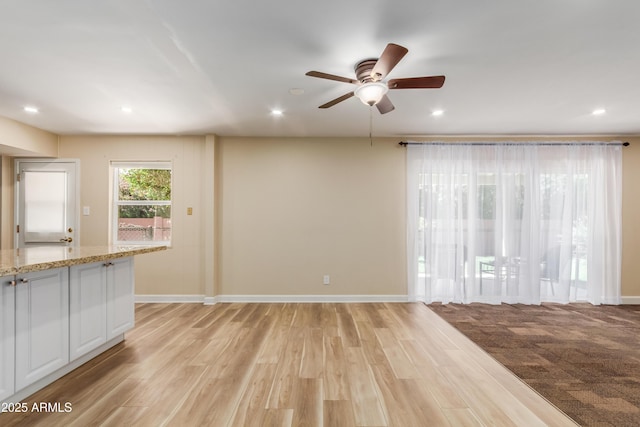 6009 W Medlock Dr, Glendale, AZ 85301 - unfurnished living room with ceiling fan, light wood-style floors, and recessed lighting