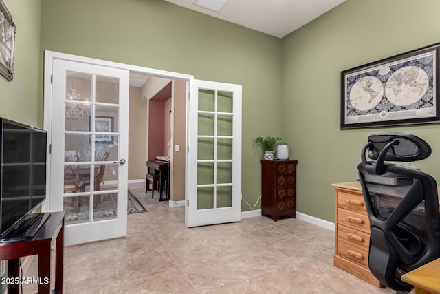 home office with french doors and baseboards