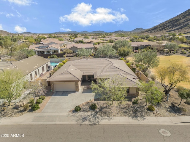 birds eye view of property featuring a residential view and a mountain view