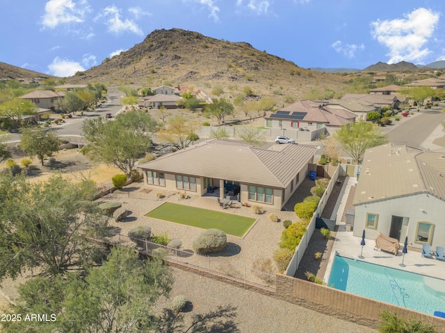 drone / aerial view with a residential view and a mountain view