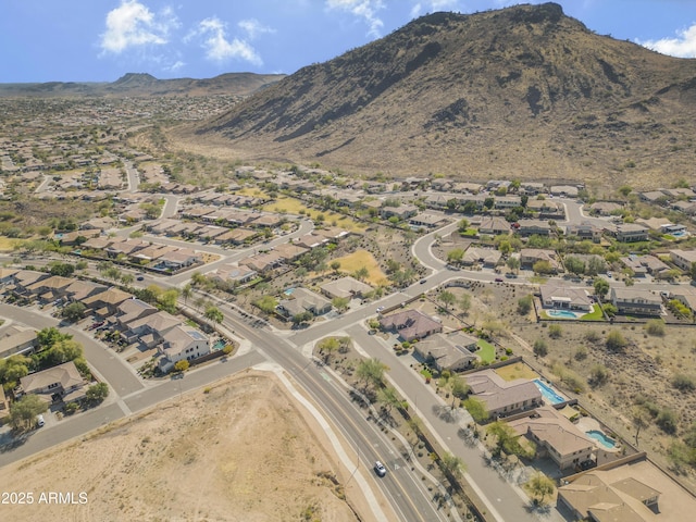 drone / aerial view with a residential view and a mountain view