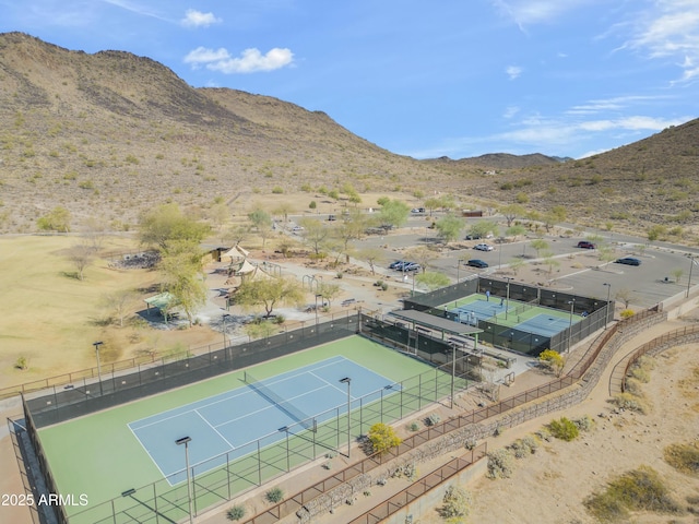 birds eye view of property featuring a mountain view