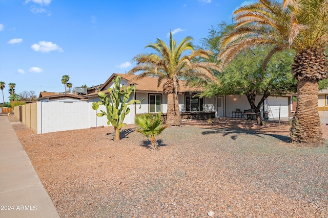 view of front of property with a garage