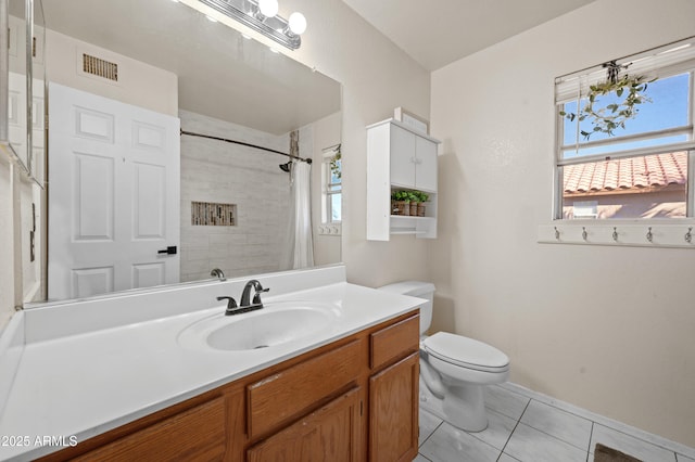 bathroom featuring tile patterned flooring, vanity, toilet, and a shower with shower curtain