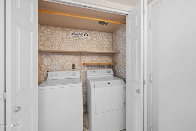 washroom featuring independent washer and dryer