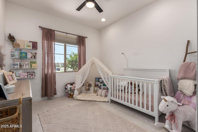6356 S Granite St, Gilbert, AZ 85298 - bedroom featuring carpet flooring, a crib, a ceiling fan, and baseboards