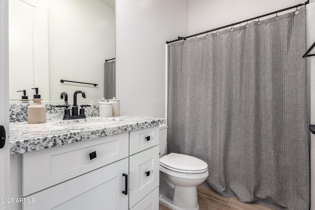 6356 S Granite St, Gilbert, AZ 85298 - full bath featuring toilet, vanity, wood finished floors, and a shower with curtain
