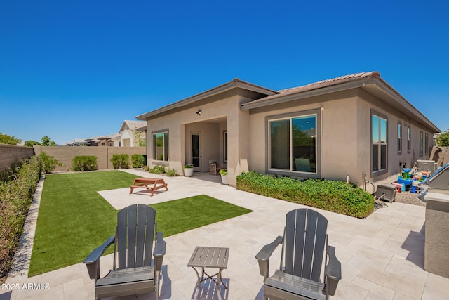 6356 S Granite St, Gilbert, AZ 85298 - rear view of property featuring stucco siding and a patio area