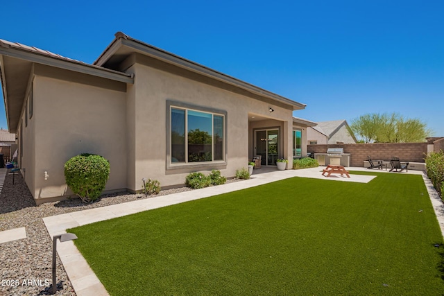 6356 S Granite St, Gilbert, AZ 85298 - rear view of house with a patio area, stucco siding, and an outdoor kitchen