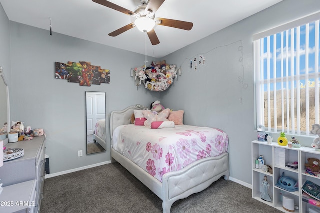 bedroom with dark carpet and ceiling fan