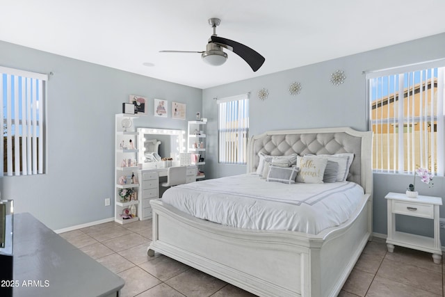 tiled bedroom with ceiling fan