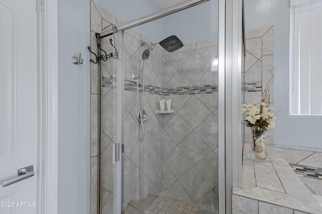 bathroom featuring an enclosed shower