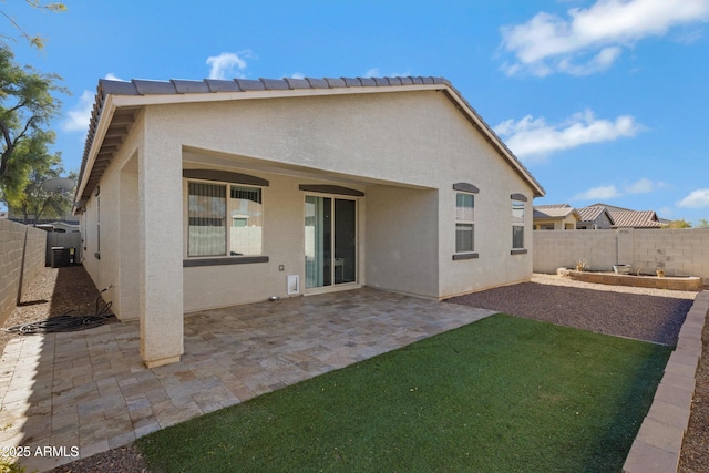 rear view of property with a patio