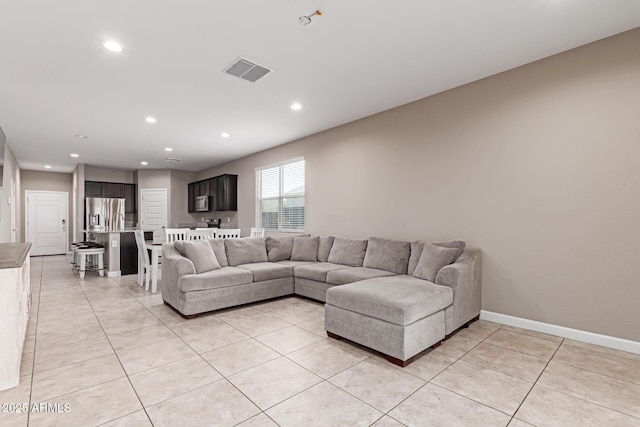 18800 W Madison St, Buckeye, AZ 85326 - living area with visible vents, baseboards, and light tile patterned floors