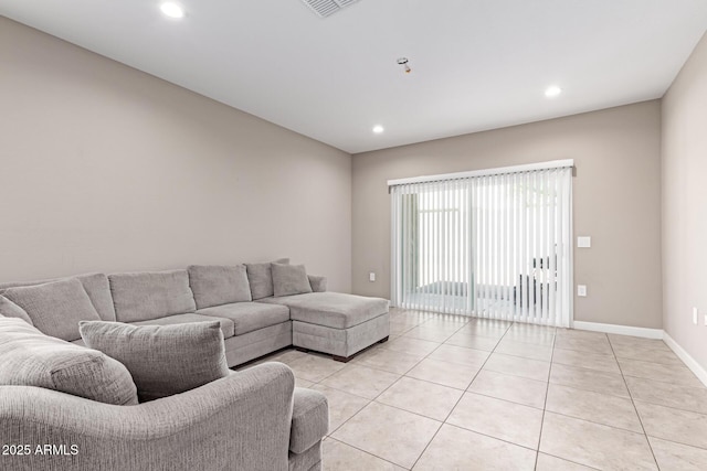 18800 W Madison St, Buckeye, AZ 85326 - living area with light tile patterned floors, baseboards, and recessed lighting