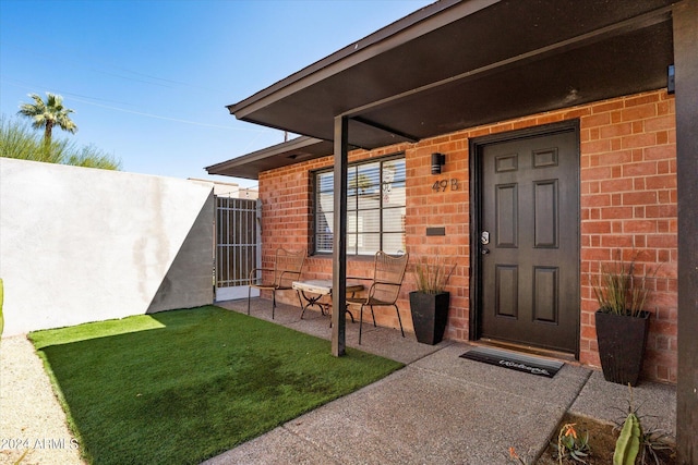 entrance to property with a porch