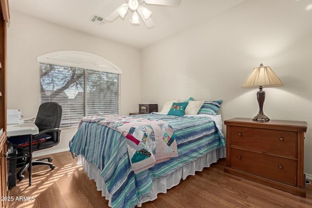 bedroom featuring hardwood / wood-style floors and ceiling fan