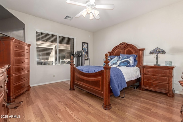 bedroom featuring ceiling fan and light wood-type flooring