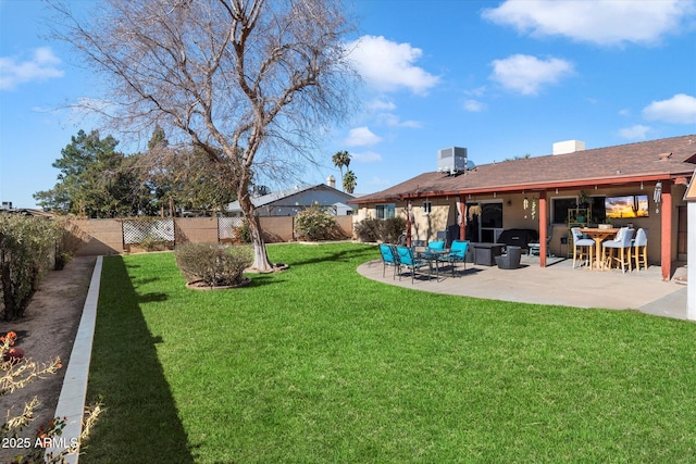 view of yard with a patio and central AC