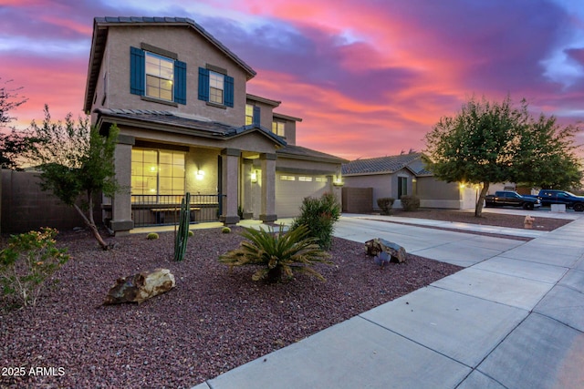 front of property with a garage