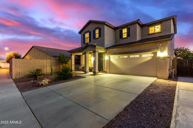 view of front of home with a garage