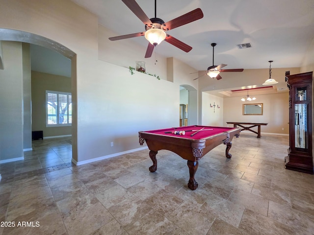 recreation room featuring visible vents, baseboards, pool table, arched walkways, and stone finish flooring