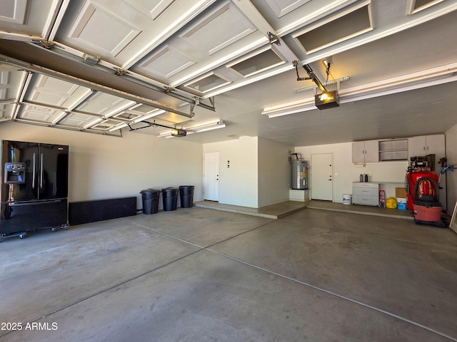 garage with black refrigerator with ice dispenser, a garage door opener, and electric water heater