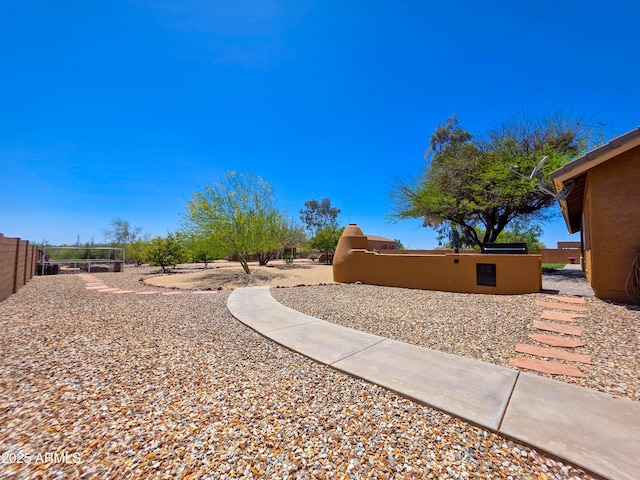 view of yard featuring fence