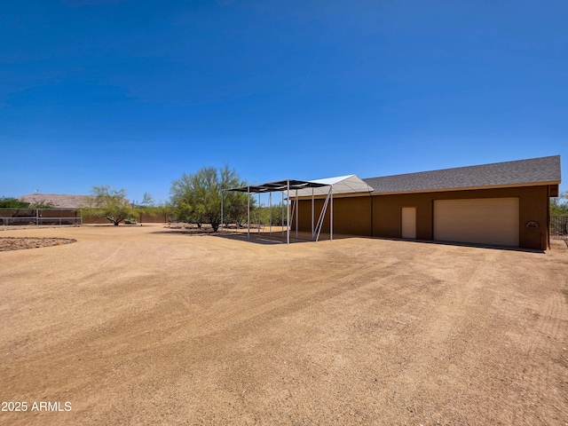 view of yard with a garage