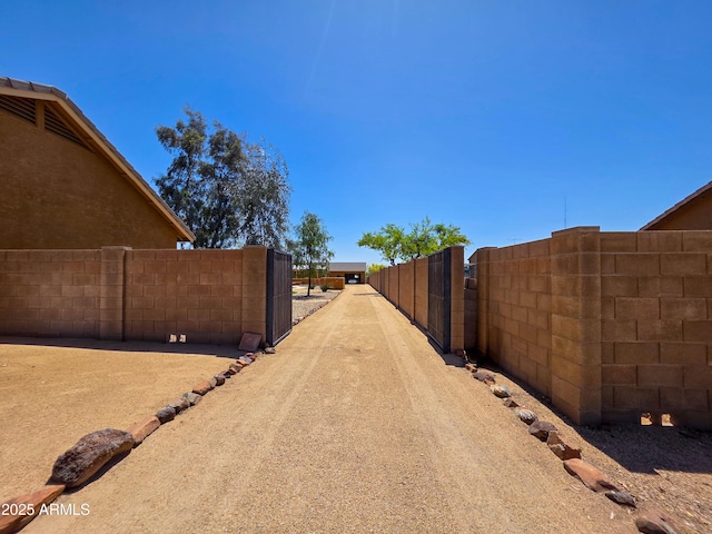 view of street with a gate