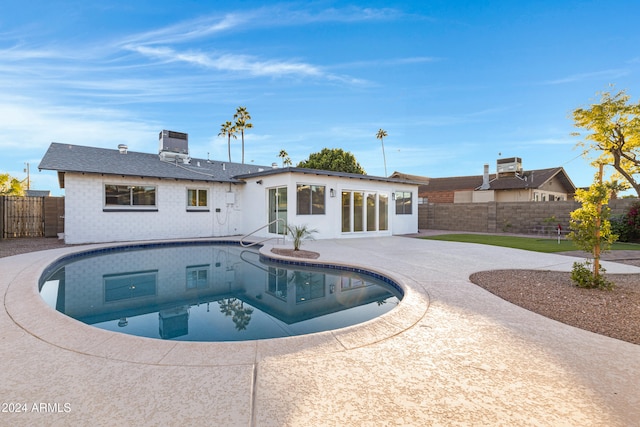 view of pool featuring a patio