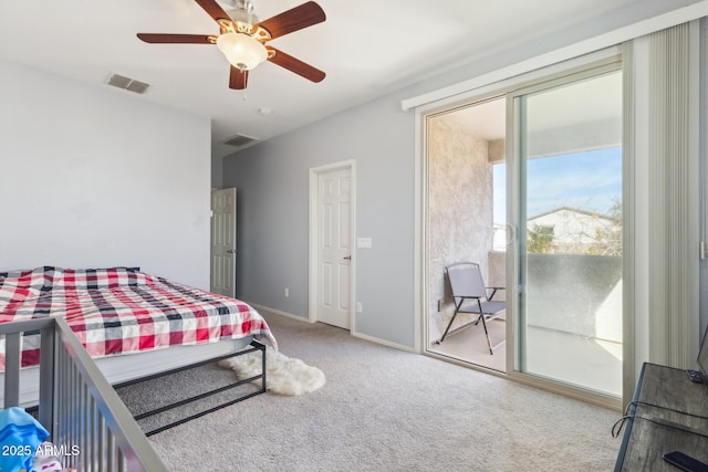 carpeted bedroom featuring access to exterior and ceiling fan