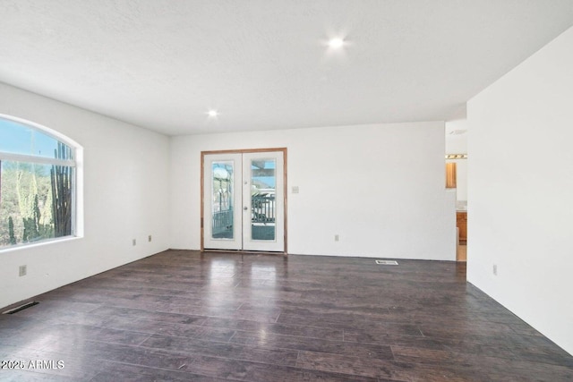 8343 W Calle Lejos, Peoria, AZ 85383 - spare room featuring wood finished floors, french doors, and recessed lighting